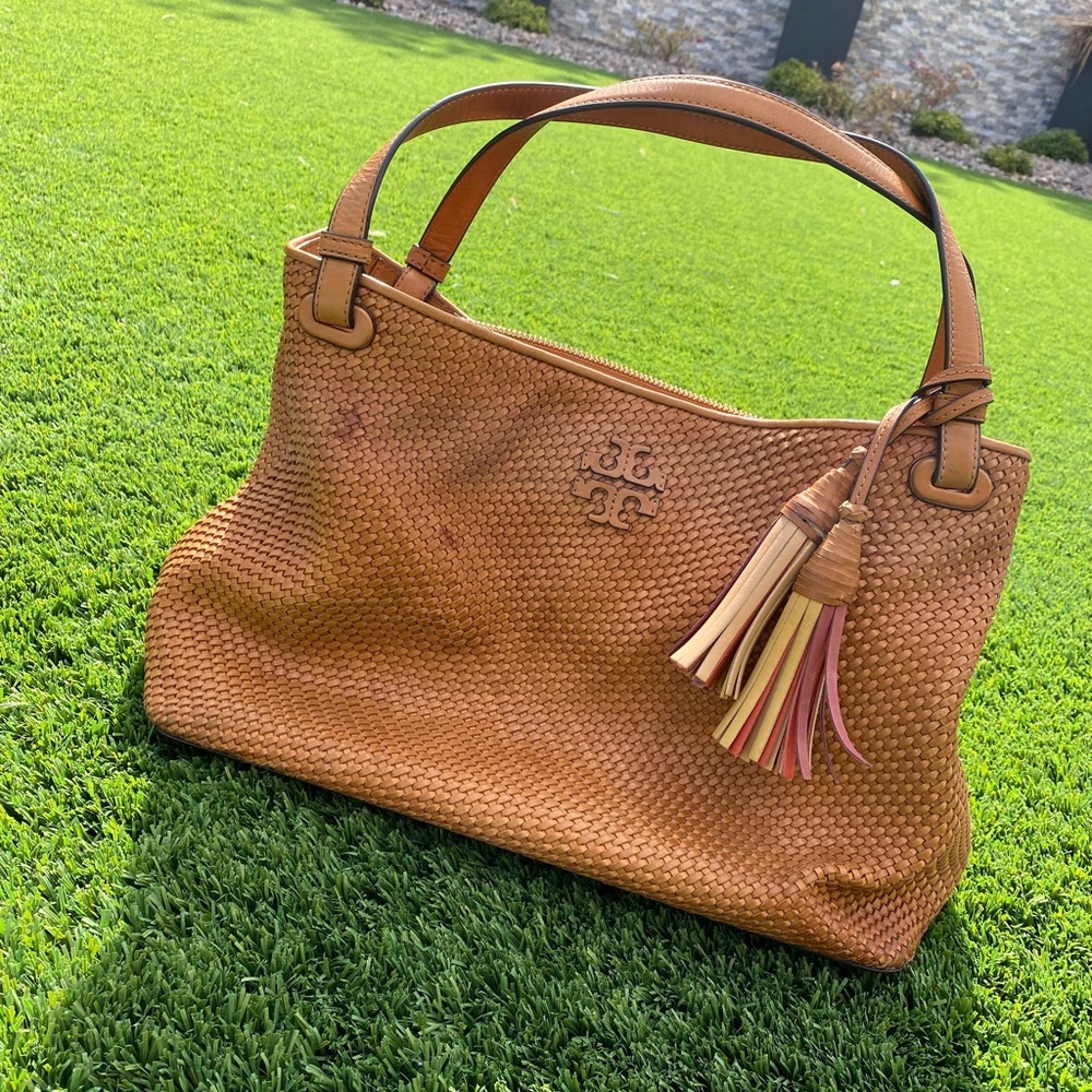 Tory Burch woven leather handbag.